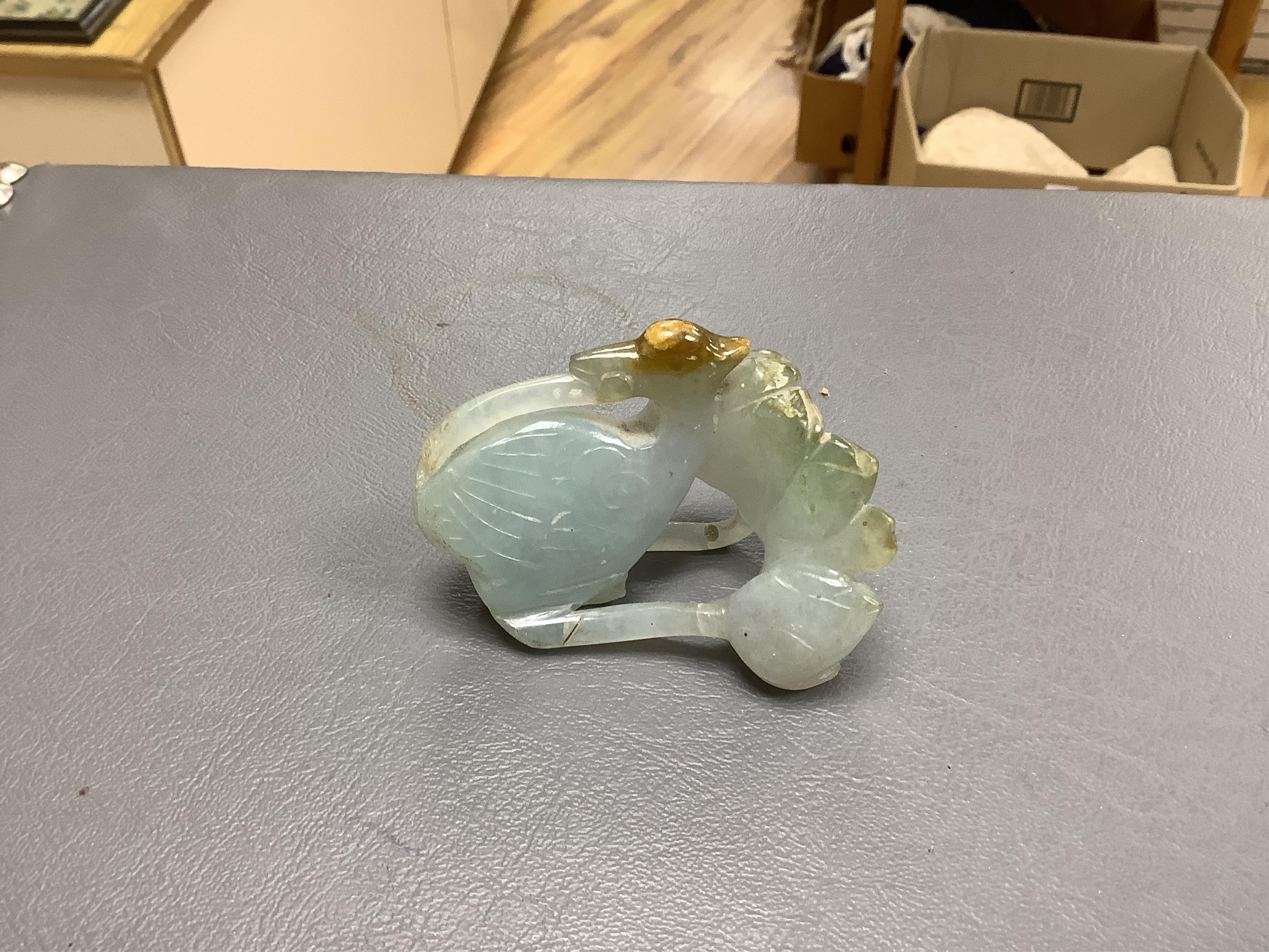 A Chinese jade figure of a Mandarin duck and a miniature pot and cover, three jadeite carvings and a bowenite dragon, 16.5cm